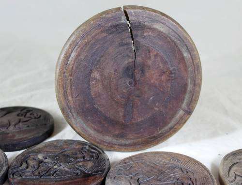 Set of six wooden coasters in container