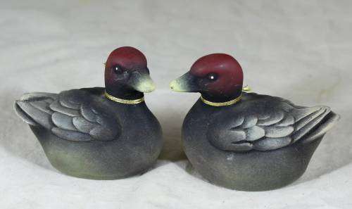 Pair of small molded ducks