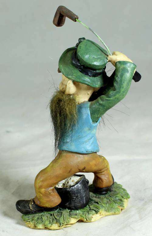 Leprechaun golfer taking a swing
