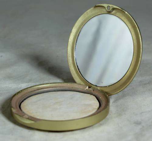 Powder compact