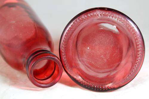 Pair of large red bottles