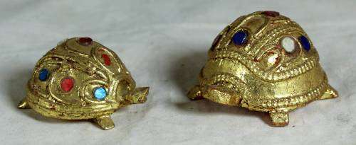 Pair of miniature molded tortoises