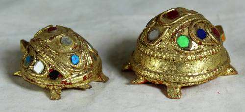 Pair of miniature molded tortoises