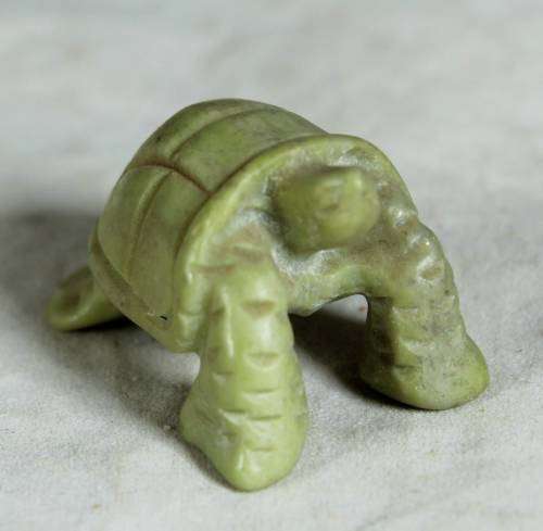 Miniature hardened plastic tortoise