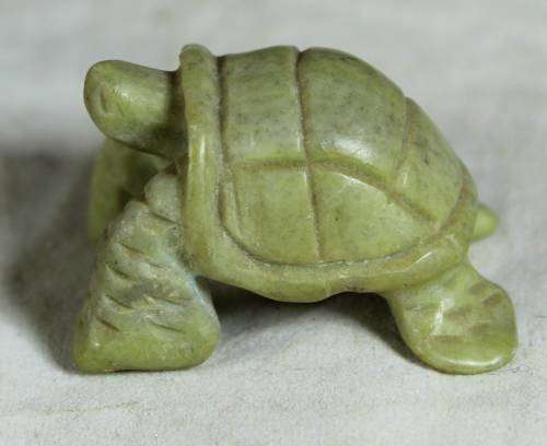 Miniature hardened plastic tortoise