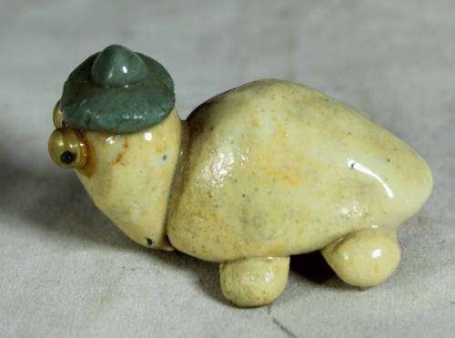 Miniature beady eyed tortoise
