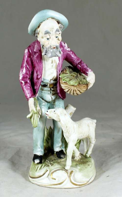 Old Man Feeding a Sheep Figurine
