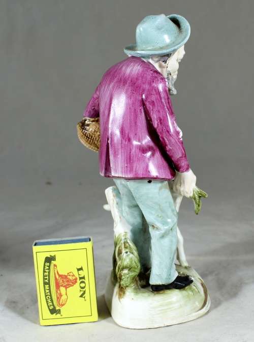 Old Man Feeding a Sheep Figurine