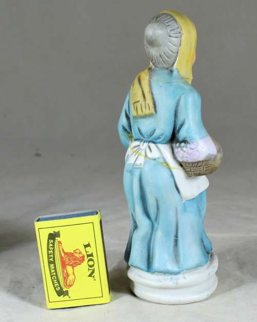 Old Woman with a Basket Figurine