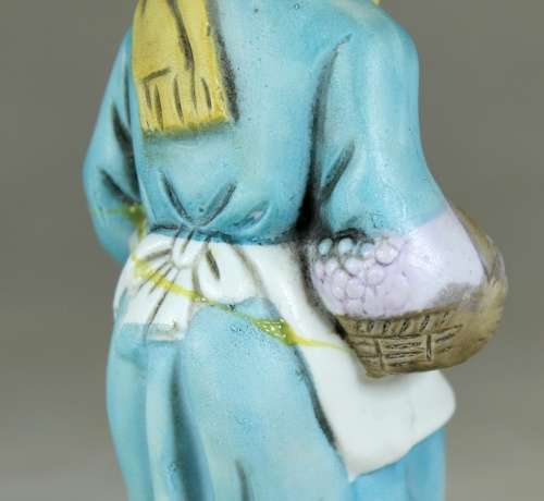 Old Woman with a Basket Figurine