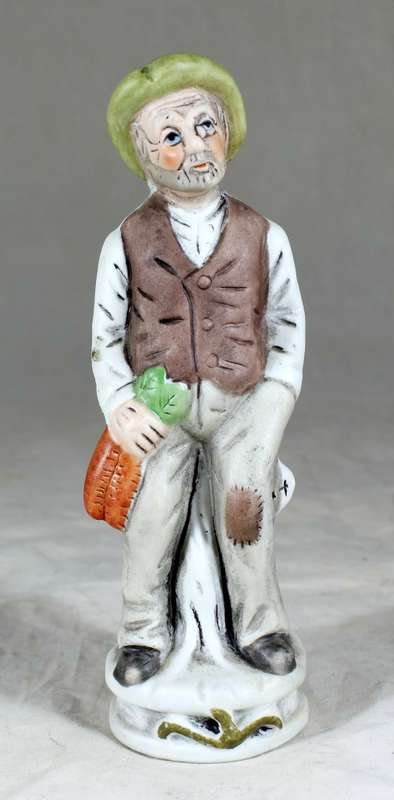 Old Man Holding Carrots Figurine