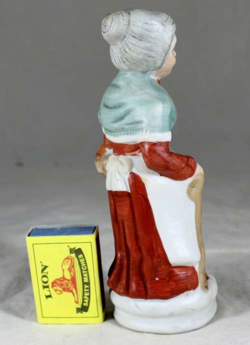 Old Woman with a Basket Figurine
