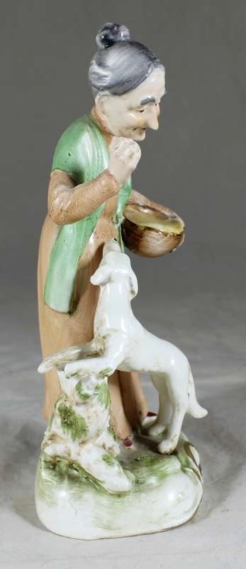 Old Woman with Dog Figurine  Bid Now!!