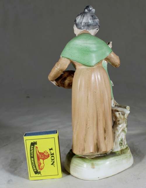 Old Woman with Dog Figurine  Bid Now!!
