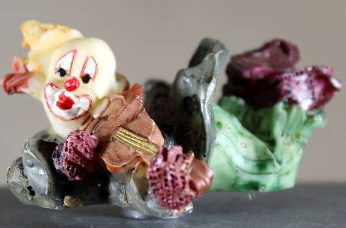 Small Clown Figurine - Laying Down Playing Violin - Fridge Magnet - BID NOW