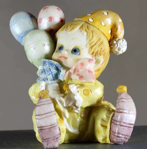 Small Clown Figurine - Baby With Balloons - BID NOW
