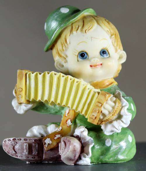 Small Clown Figurine - Kid Playing a Concertina - BID NOW