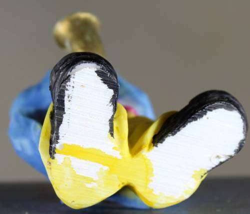 Small Clown Figurine - Playing a Saxophone - BID NOW