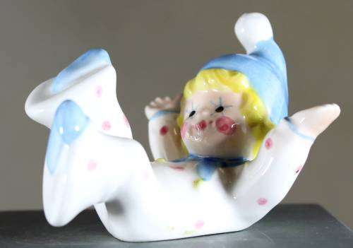 Small Clown Figurine - Boy Laying on His Back - BID NOW