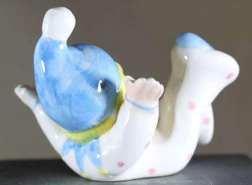 Small Clown Figurine - Boy Laying on His Back - BID NOW