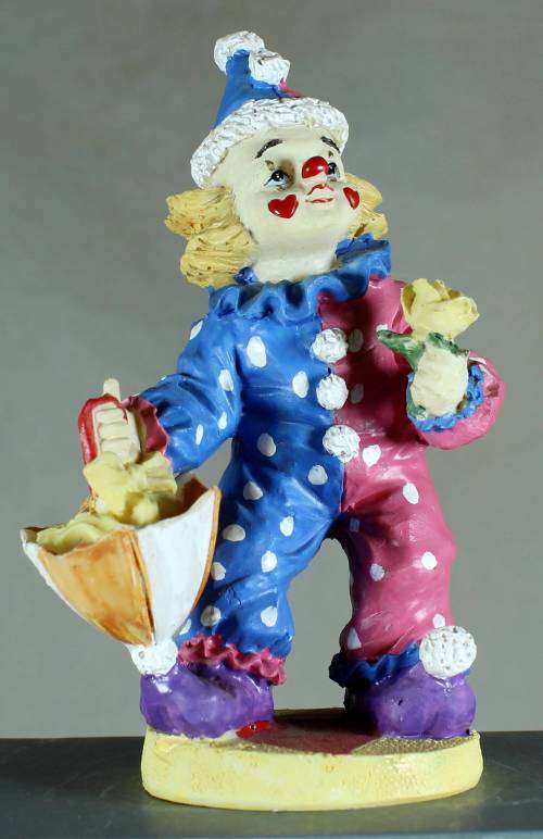 Small Clown Figurine - Holding an Umbrella and Rose - BID NOW