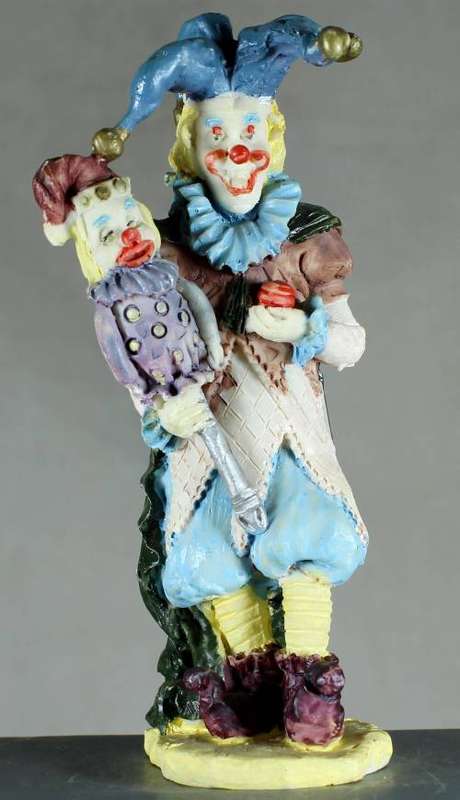 Clown figurine with puppet