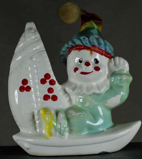 Clown Figurine - On A Sailboat - BID NOW