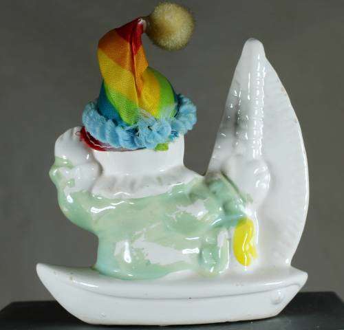 Clown Figurine - On A Sailboat - BID NOW