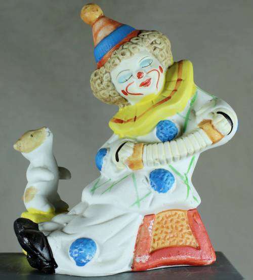 Clown Figurine -  With Puppy Playing a Concertina - BID NOW