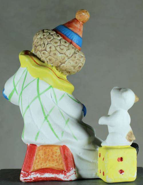 Clown Figurine -  With Puppy Playing a Concertina - BID NOW