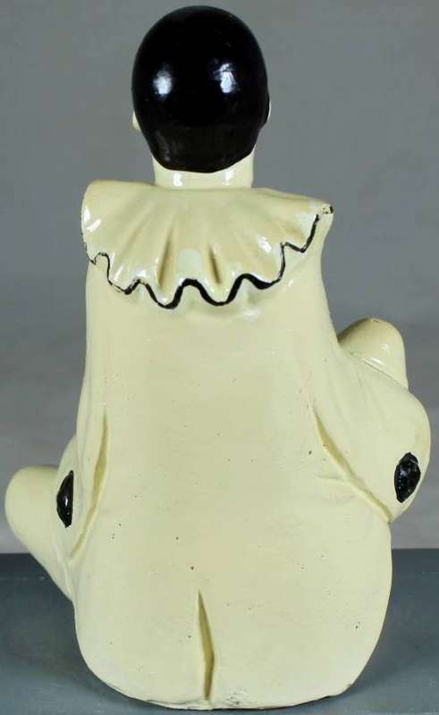 Seated Pierot figure