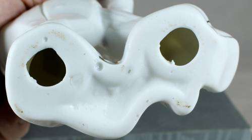 Clown figurine with a cane