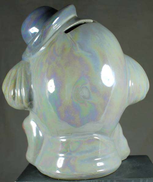 Clown figurine piggy bank with bow-tie