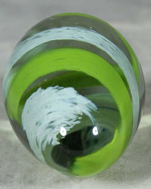 Ngwenya glass egg with green and white swirls