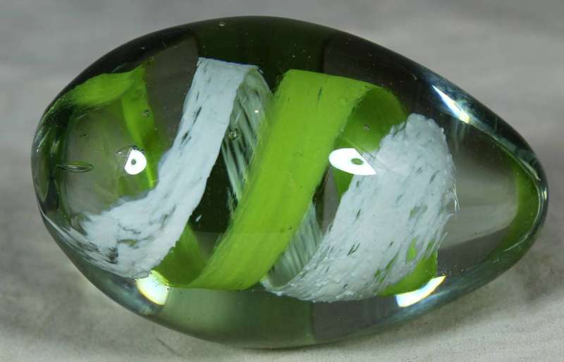 Ngwenya glass egg with green and white swirls