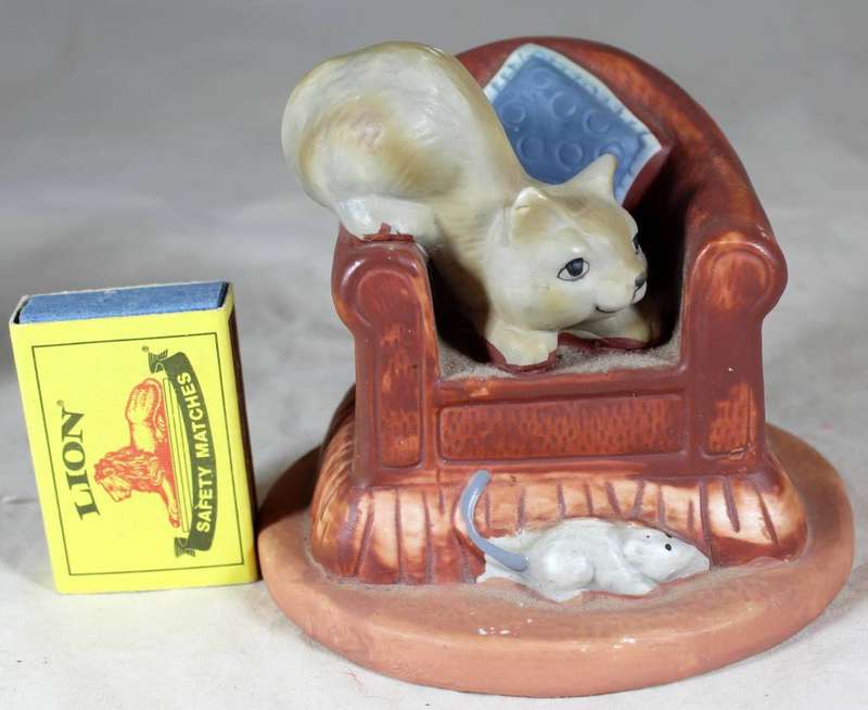 Cat and mouse on a large chair figurine