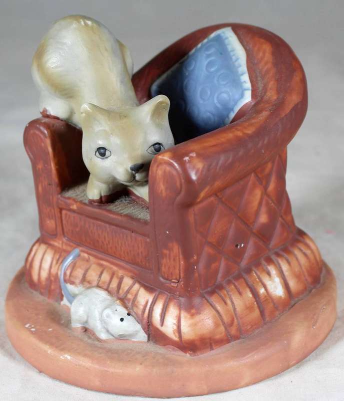 Cat and mouse on a large chair figurine