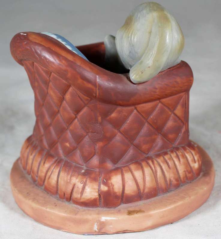 Cat and mouse on a large chair figurine