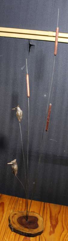 Molded birds in the reeds