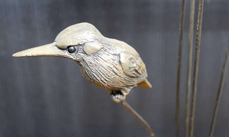 Molded birds in the reeds