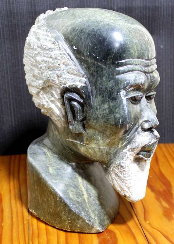 Carved stone head