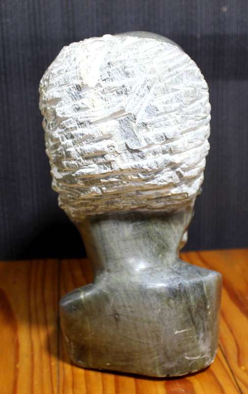 Carved stone head