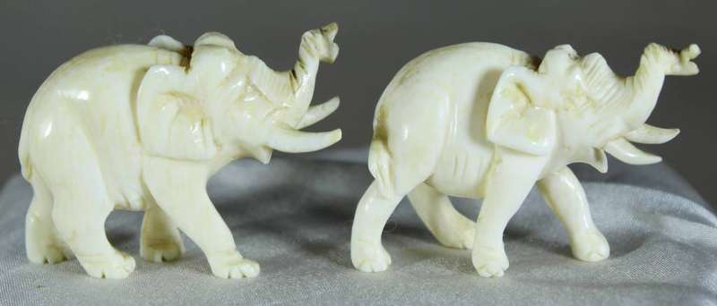 Miniature pair of molded elephants