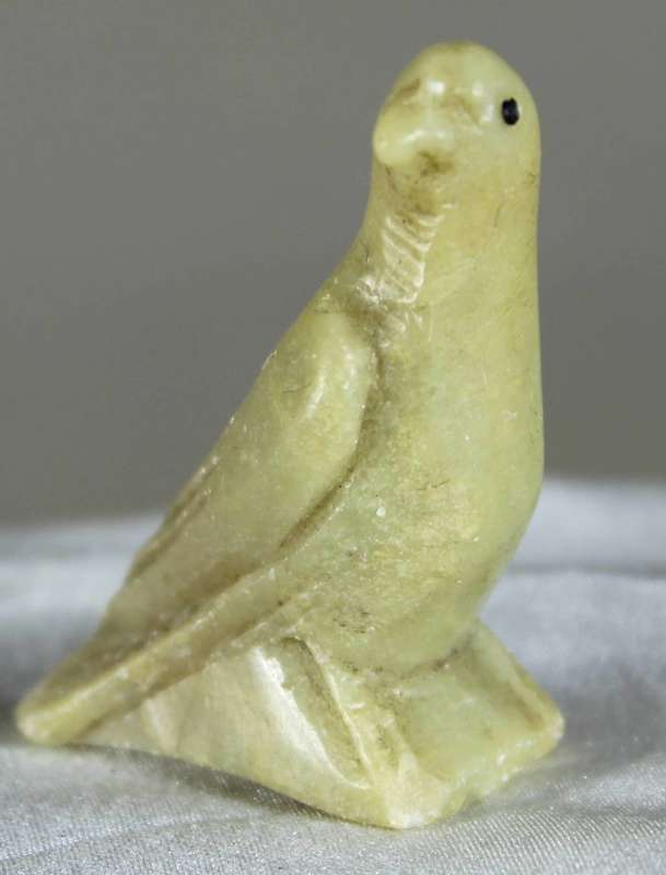 Miniature stone carved dove