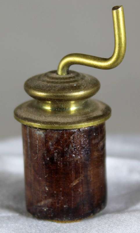 Miniature brass coffee grinder