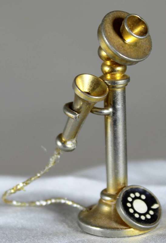 Miniature brass telephone
