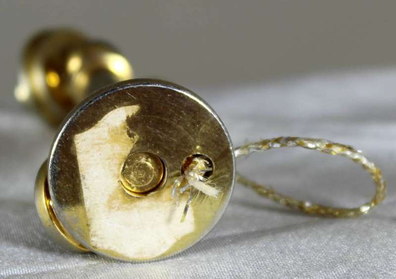 Miniature brass telephone