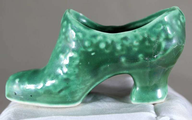 Green high heel porcelain shoe
