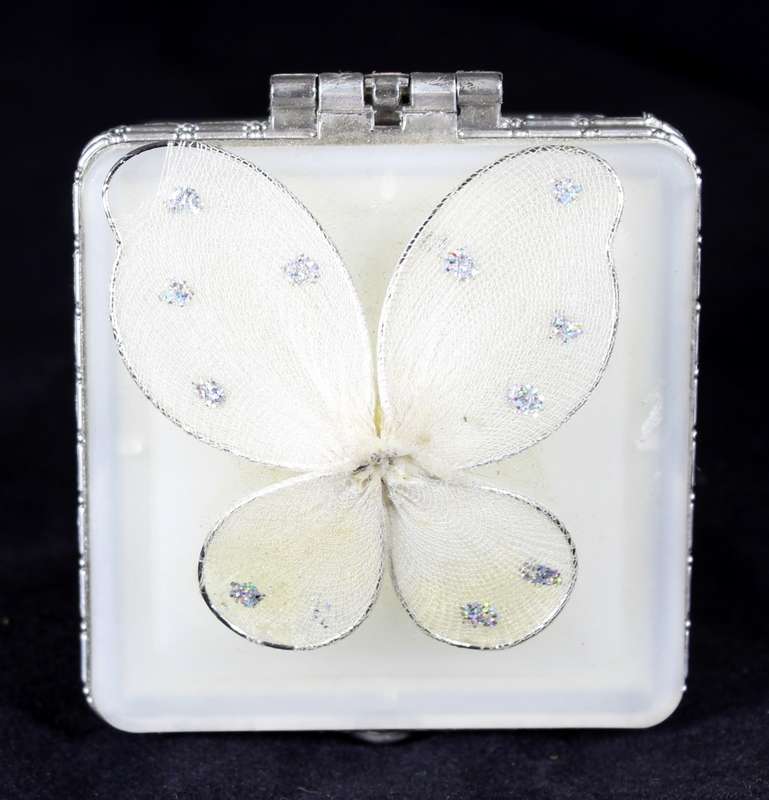 White glass trinket bowl with butterfly lid