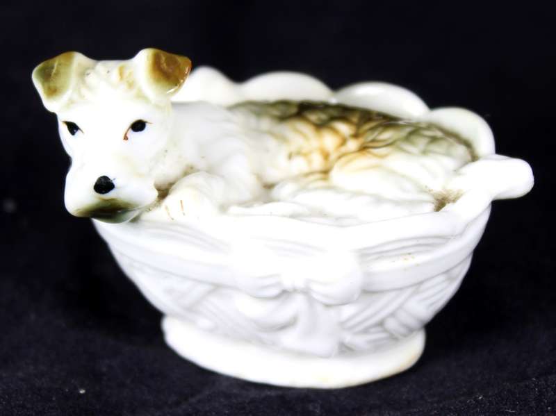 Terrier pup in basket - Bone china